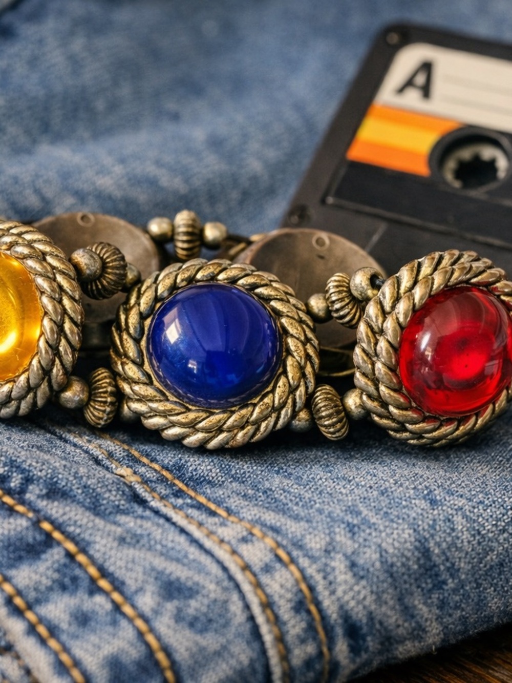 Sassy 1980’s Gripoix-Style bracelet w/ glass cabochons in rope-textured setting.